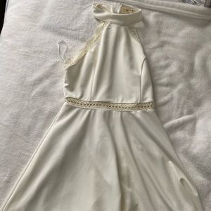 White dress with Lacey detailing high neck